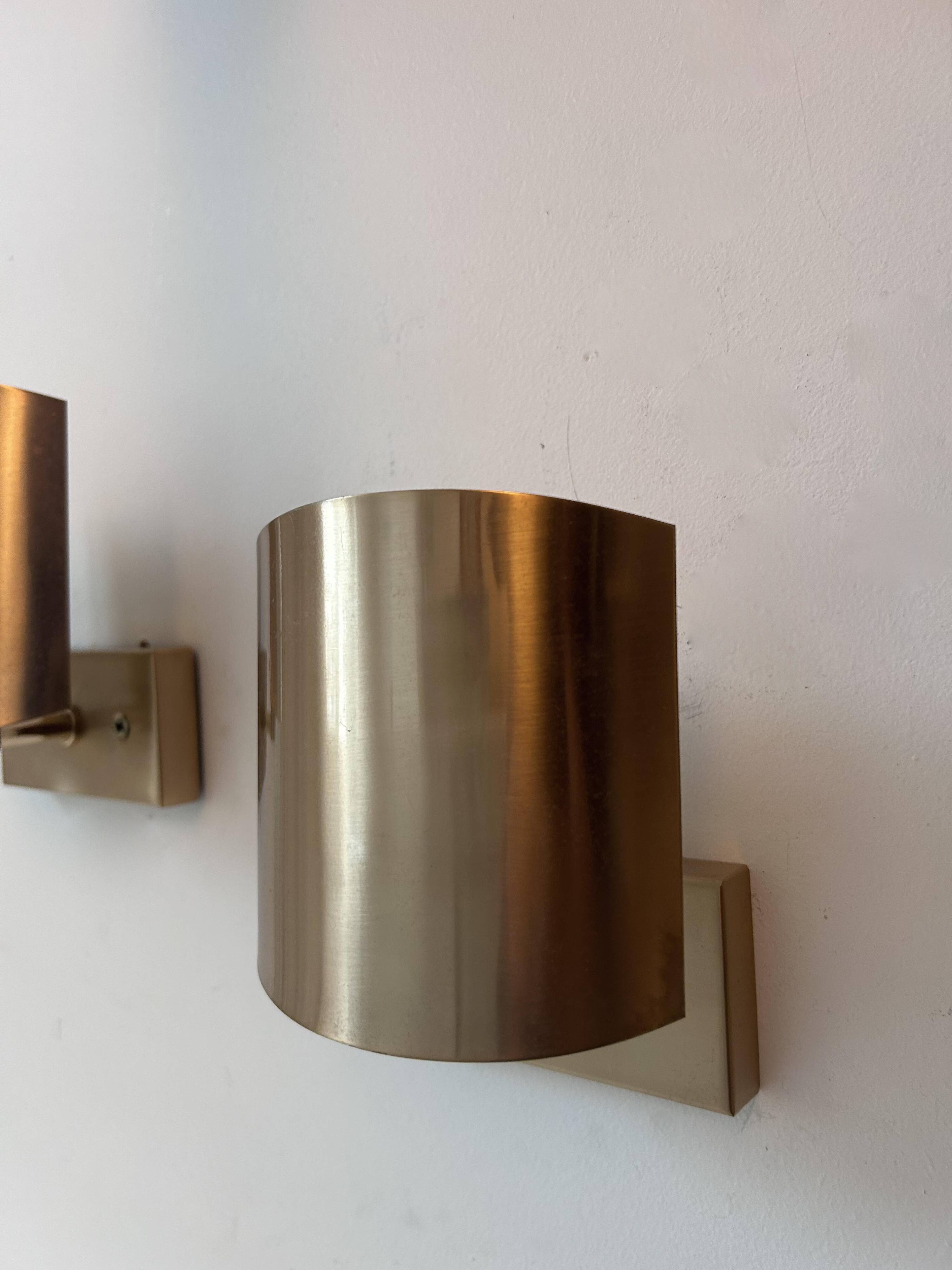 Pair of vintage adjustable wall lights, brass, SCE France 1970