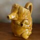 Pig slip pitcher