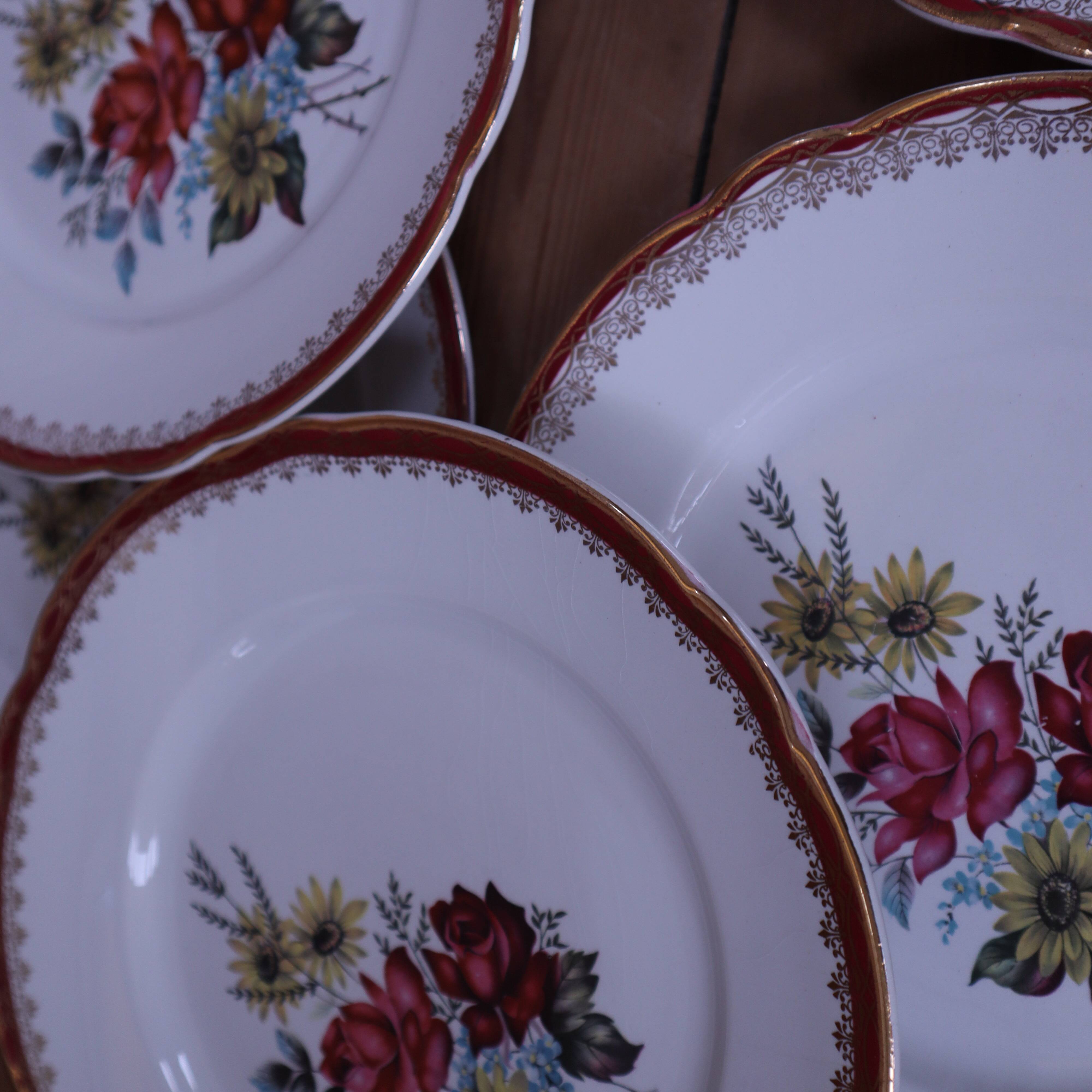 6 flat plates in half porcelain signed FB Floral decoration