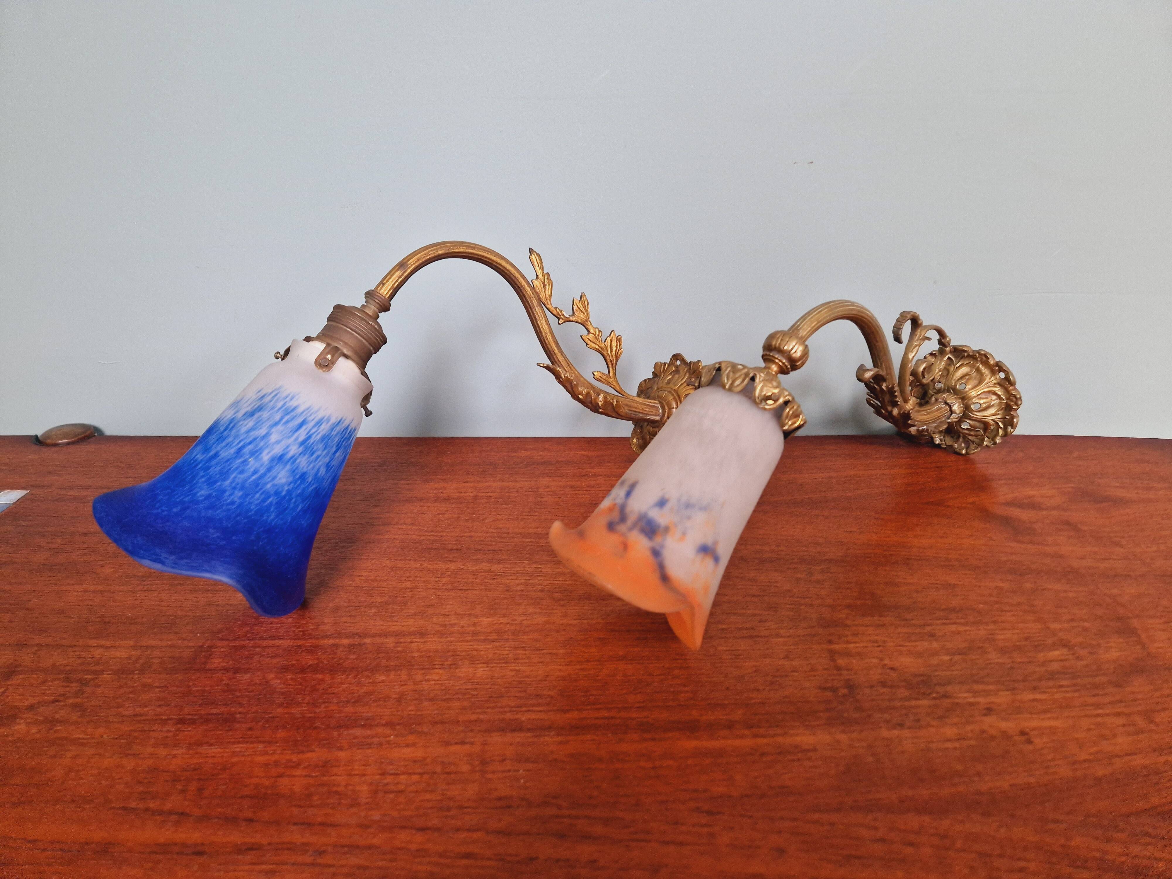 Wall light in gilded bronze and blue marmoreal glass, early 20th century