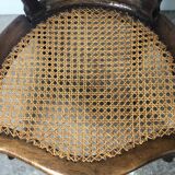 Convertible armchairs Louis XV era in walnut moulded and cannes