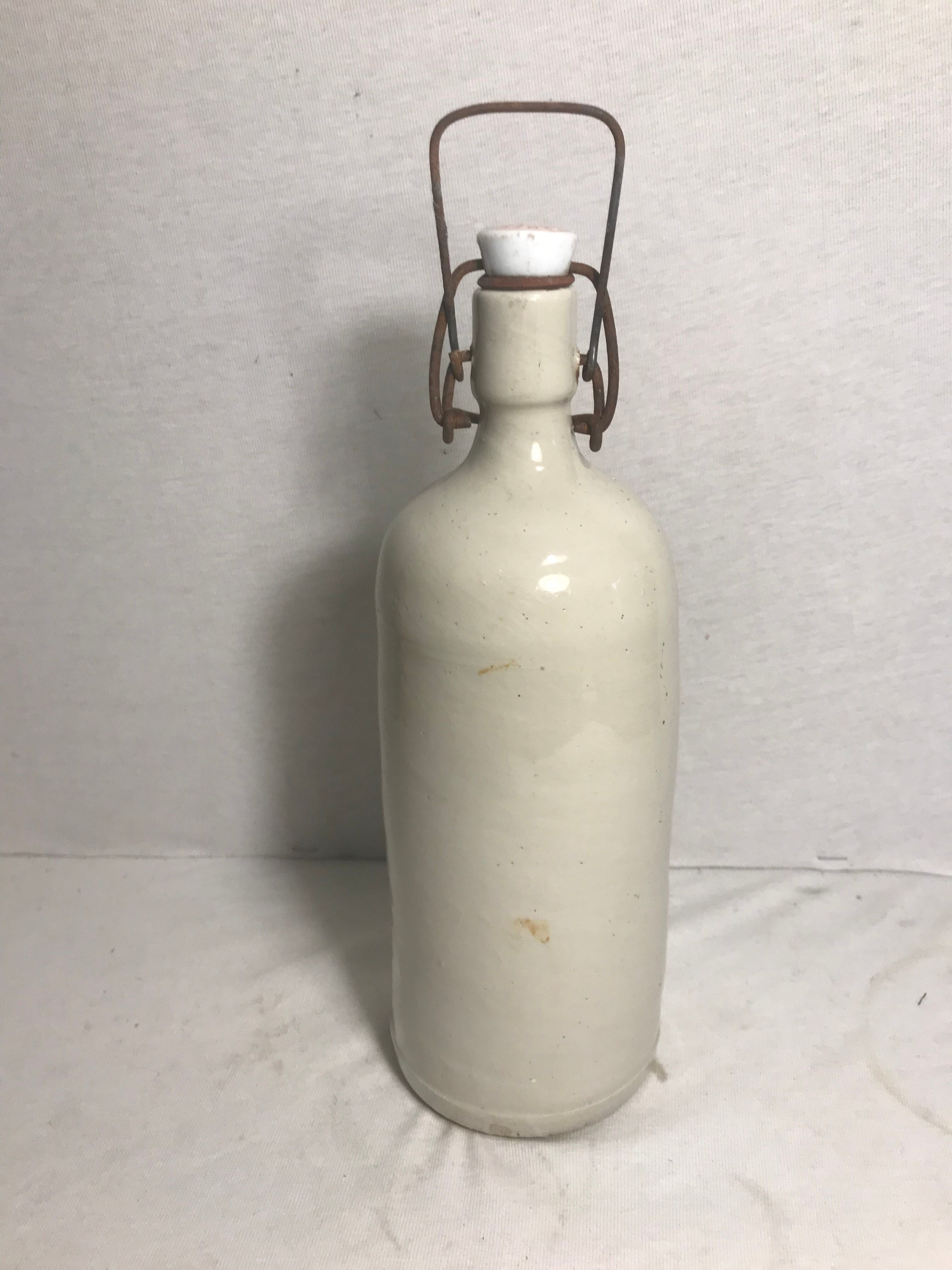 Old bottle enamelled sandstone