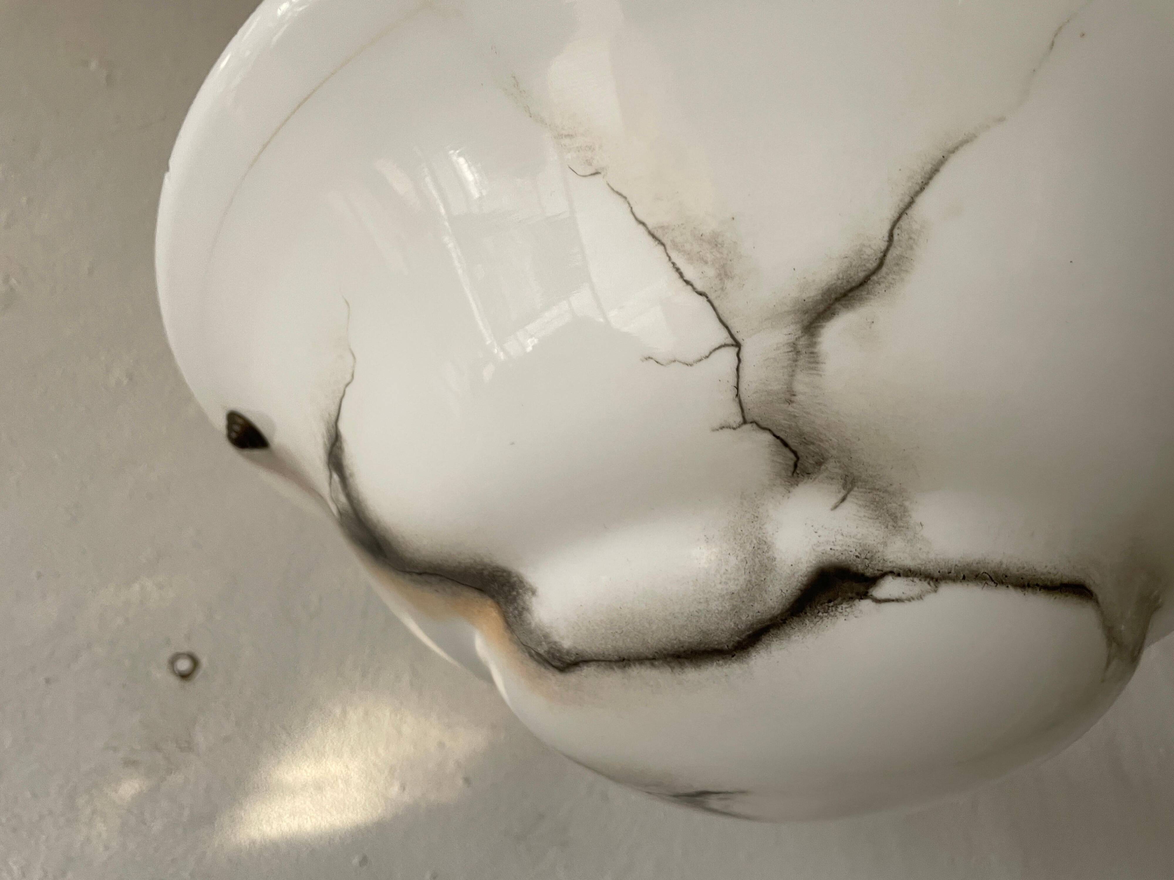 Art Deco suspended lamp in white marble-effect glass, 1940s, Germany.