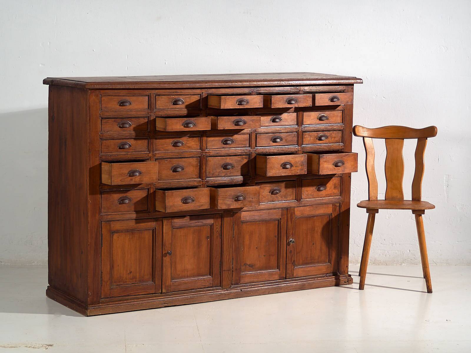 Antique multi-drawer apothecary cabinet (circa 1920)