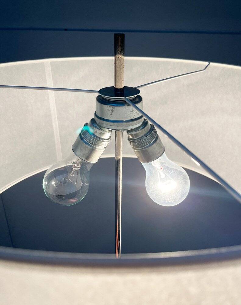 Mid-century German minimalist tripod floor lamp from the 1960s.