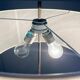 Mid-century German minimalist tripod floor lamp from the 1960s.