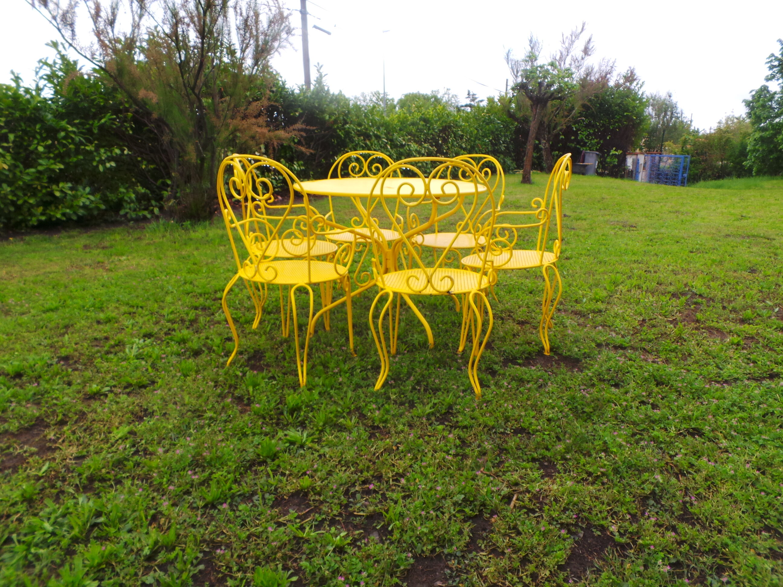 Yellow wrought iron garden room