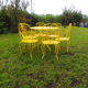 Yellow wrought iron garden room