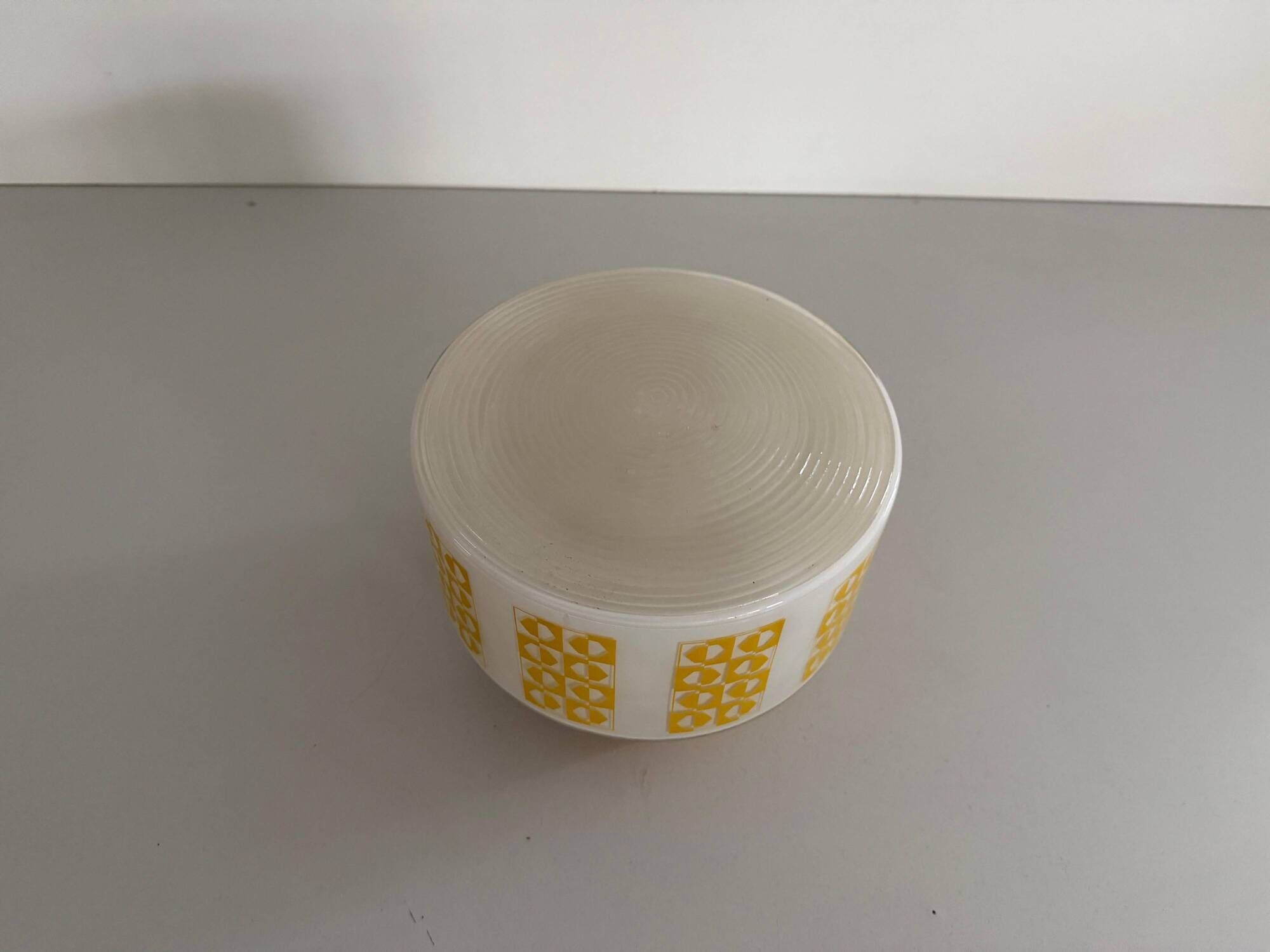 Ceiling light or wall sconce in opal glass with yellow decorations by VEB, 1950s, Germany.