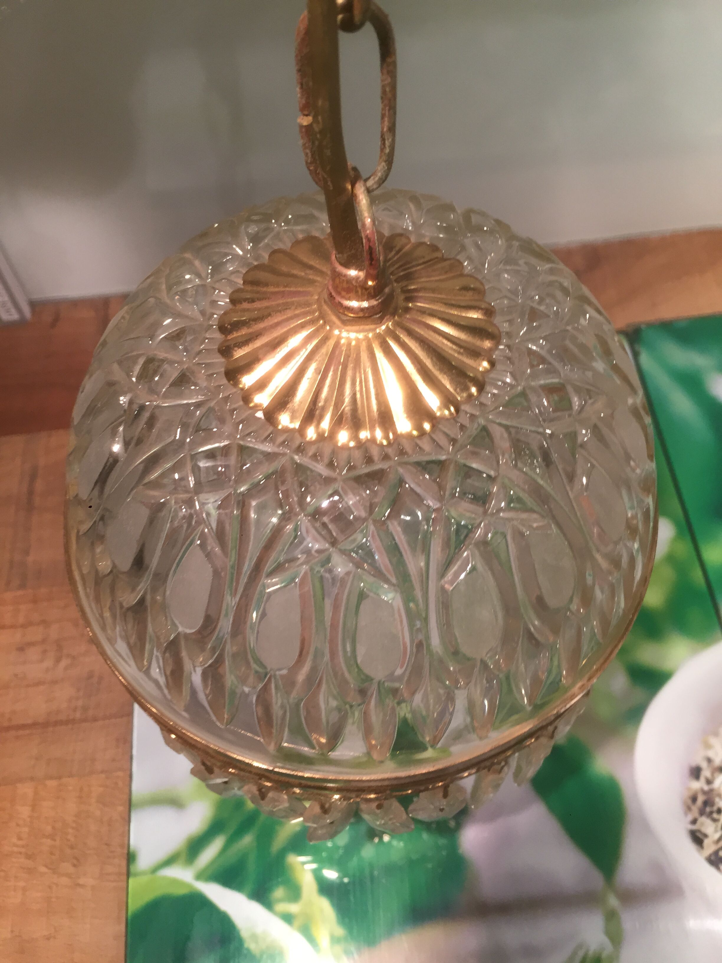 Hanging glass and stamps