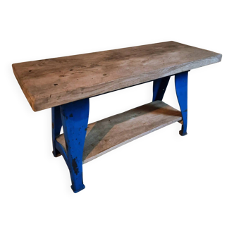Vintage industrial workbench table with cast iron legs (Aux Forges de Vulcain)