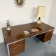 Vintage desk with rosewood veneer and chrome metal design from the 1970s.