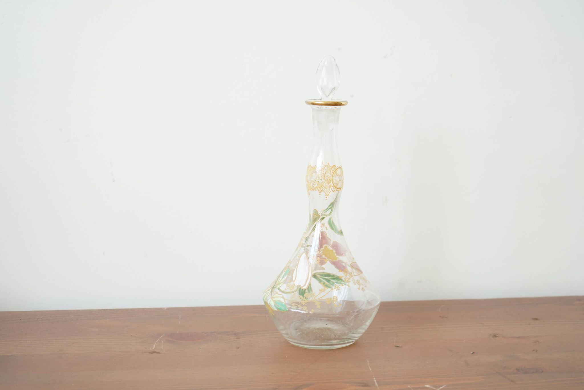 Legras (late 19th century) liqueur carafe in enamelled glass with floral decoration.
