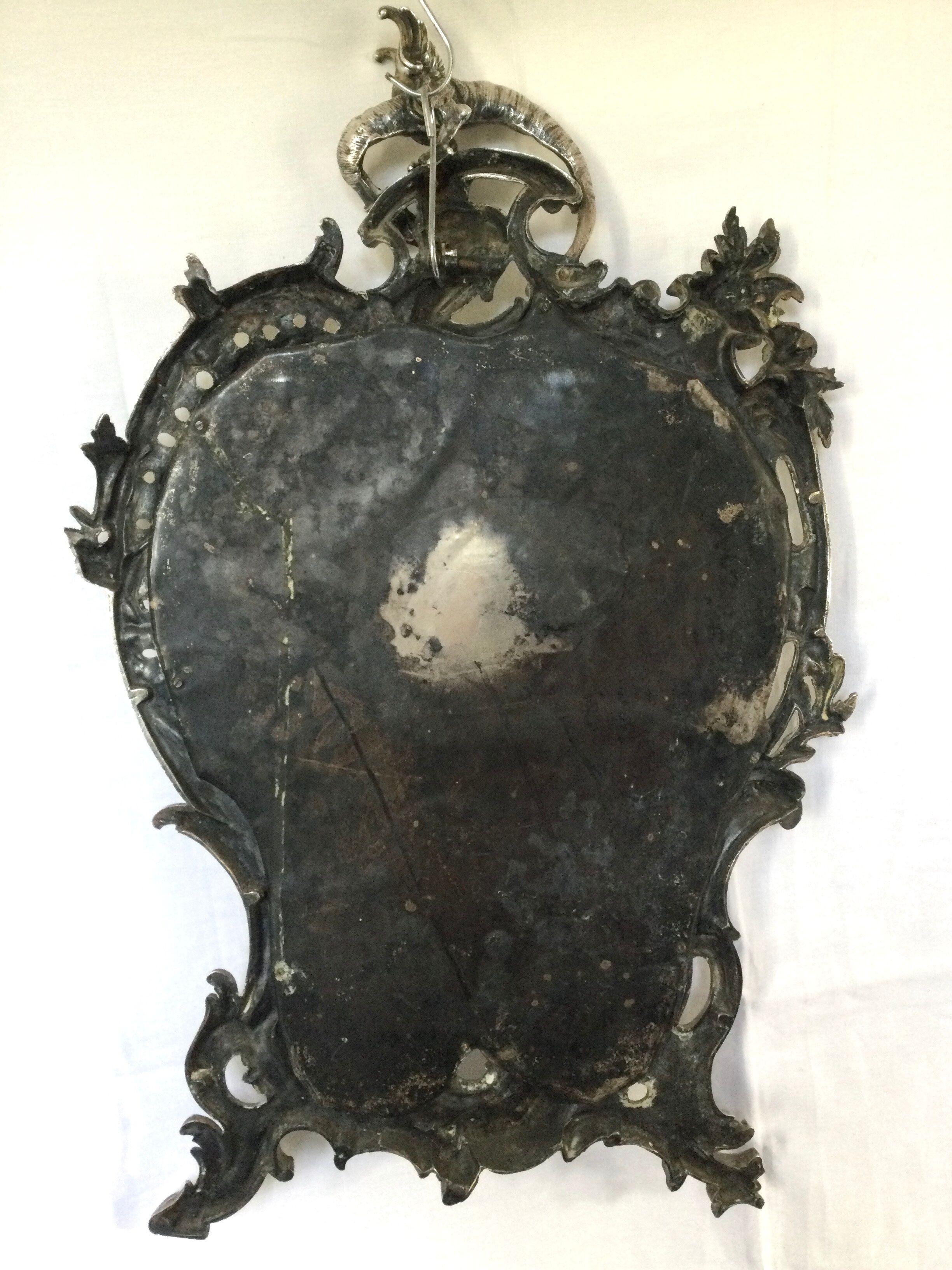 Nineteenth century mirror in silver bronze