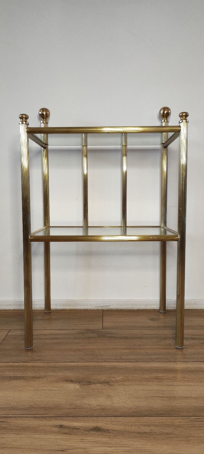 Bedside table in brass and glass.