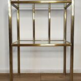 Bedside table in brass and glass.