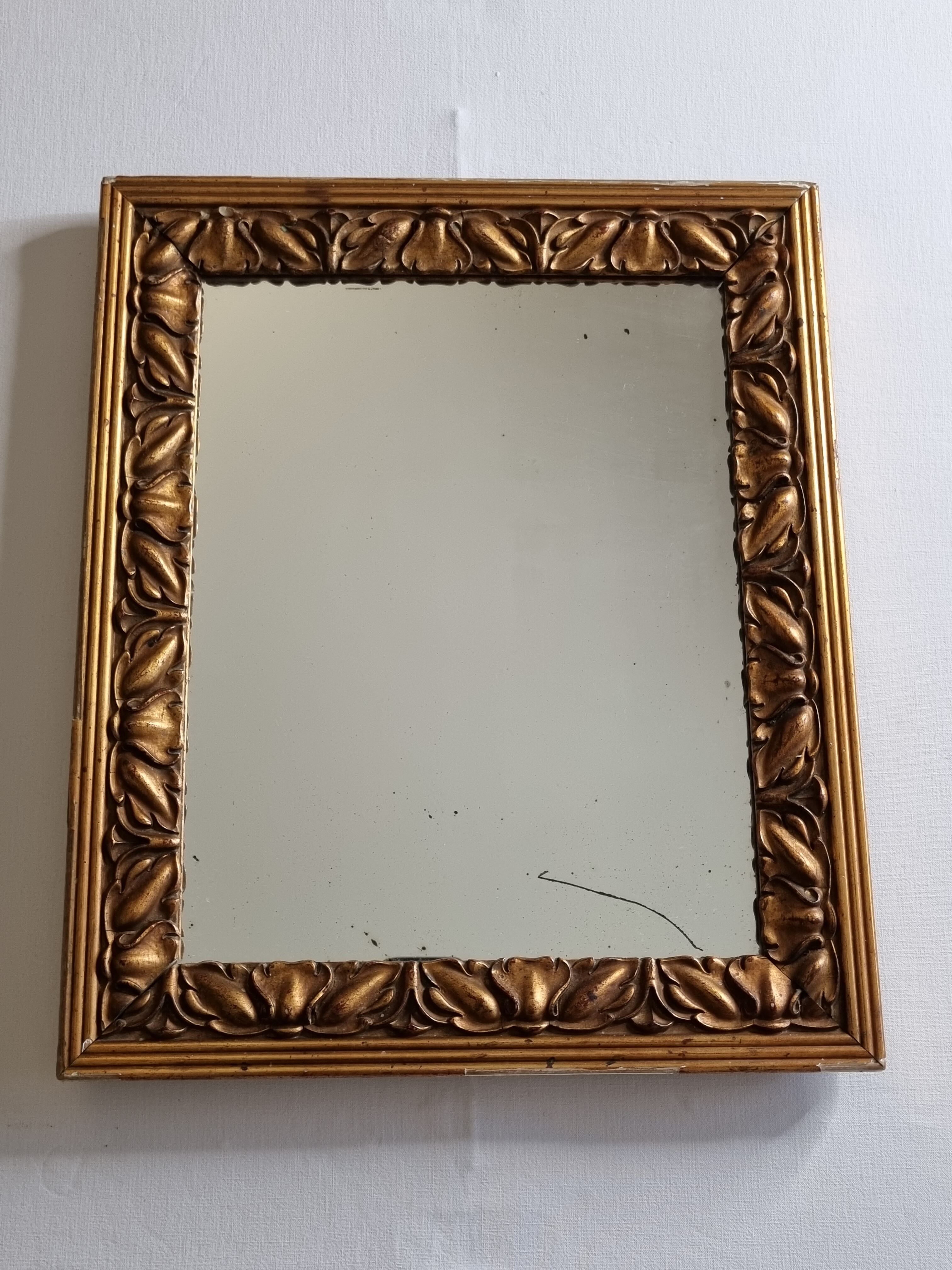 Patinated golden rectangular mirror, decorated with acanthus leaves, 49 cm