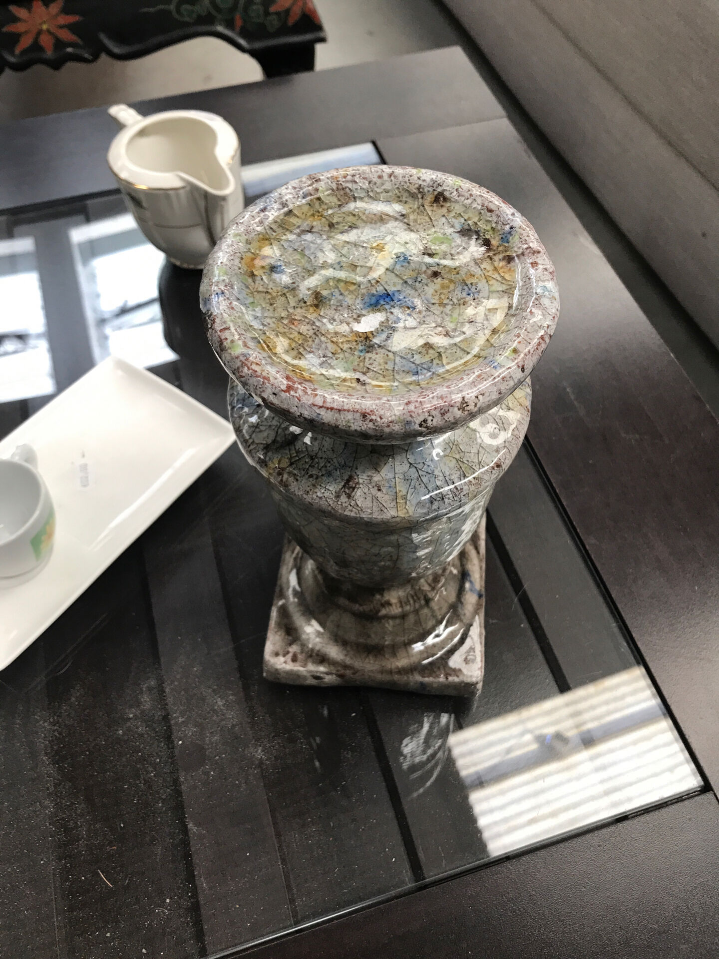 Ceramic candle holder in "Raku" style, blue-grey crackled.