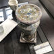 Ceramic candle holder in "Raku" style, blue-grey crackled.