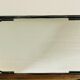 Vintage rectangular wall mirror in tubular metal and brass, 1970s/1980s.