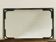 Vintage rectangular wall mirror in tubular metal and brass, 1970s/1980s.