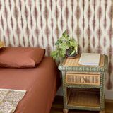 Set of 2 vintage woven rattan bedside tables.