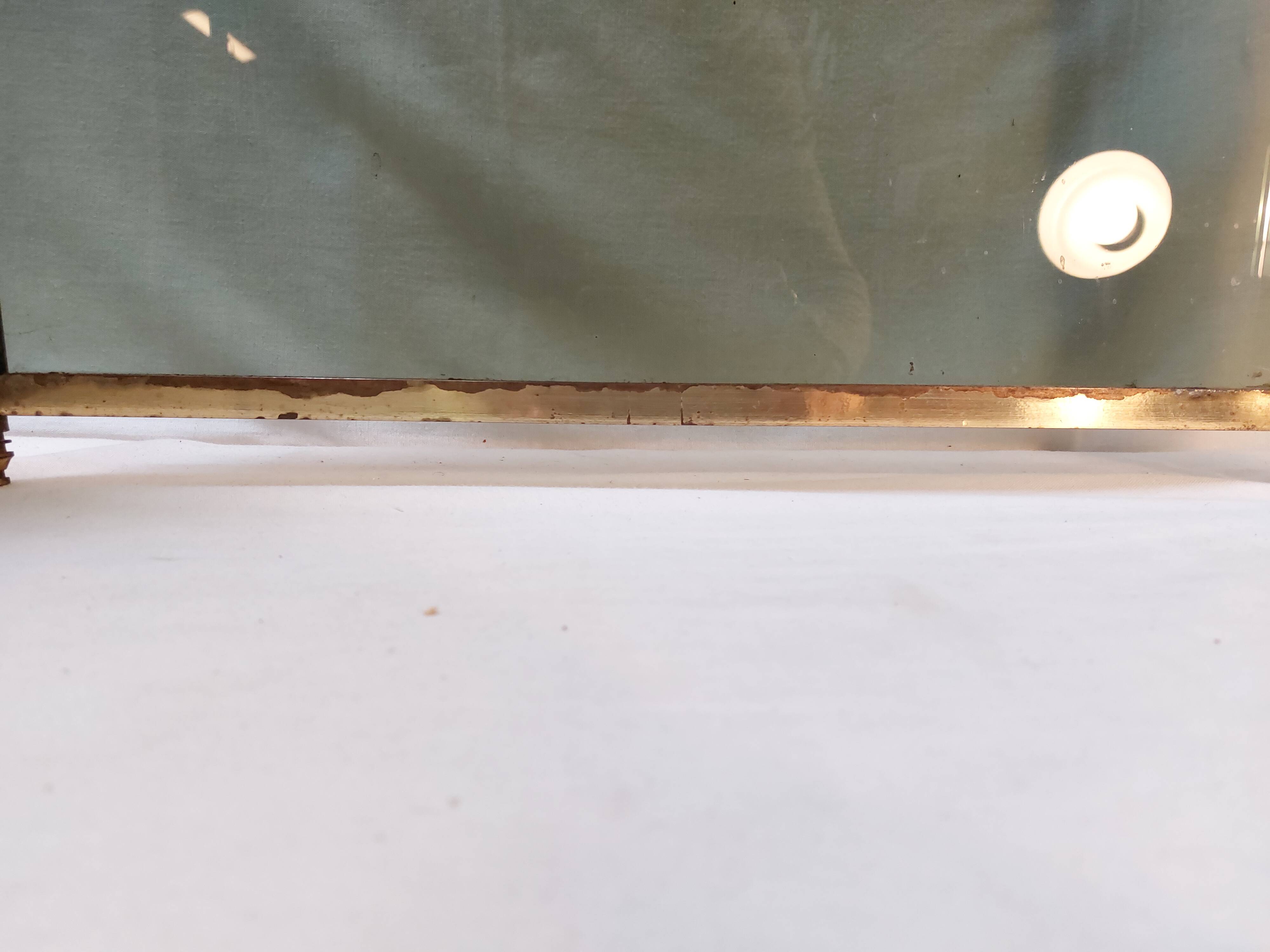 Vintage fireplace screen in smoked glass and gold-tone metal