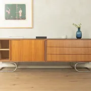 Striking mid-century sideboard with stainless steel base