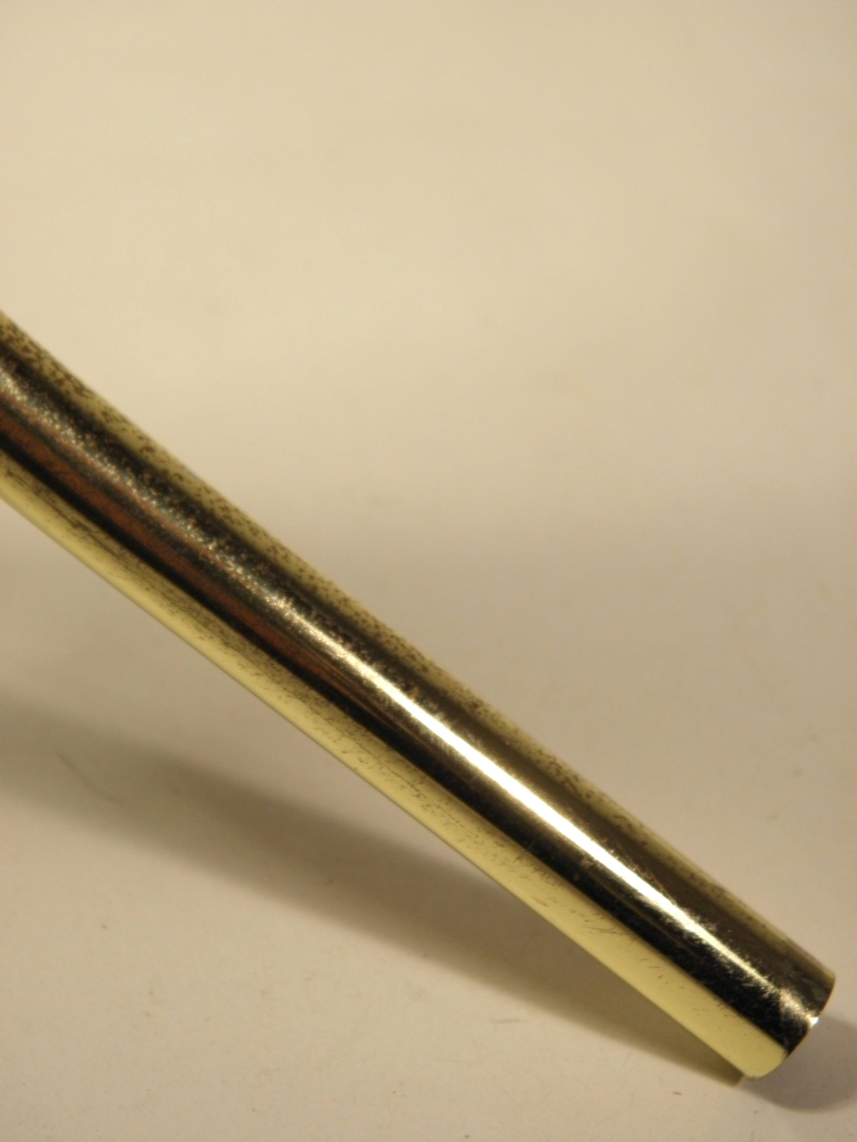 Tripod stand in gold metal and glass