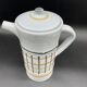 Vintage 1960s coffee service in ceramic, modernist design.