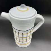 Vintage 1960s coffee service in ceramic, modernist design.