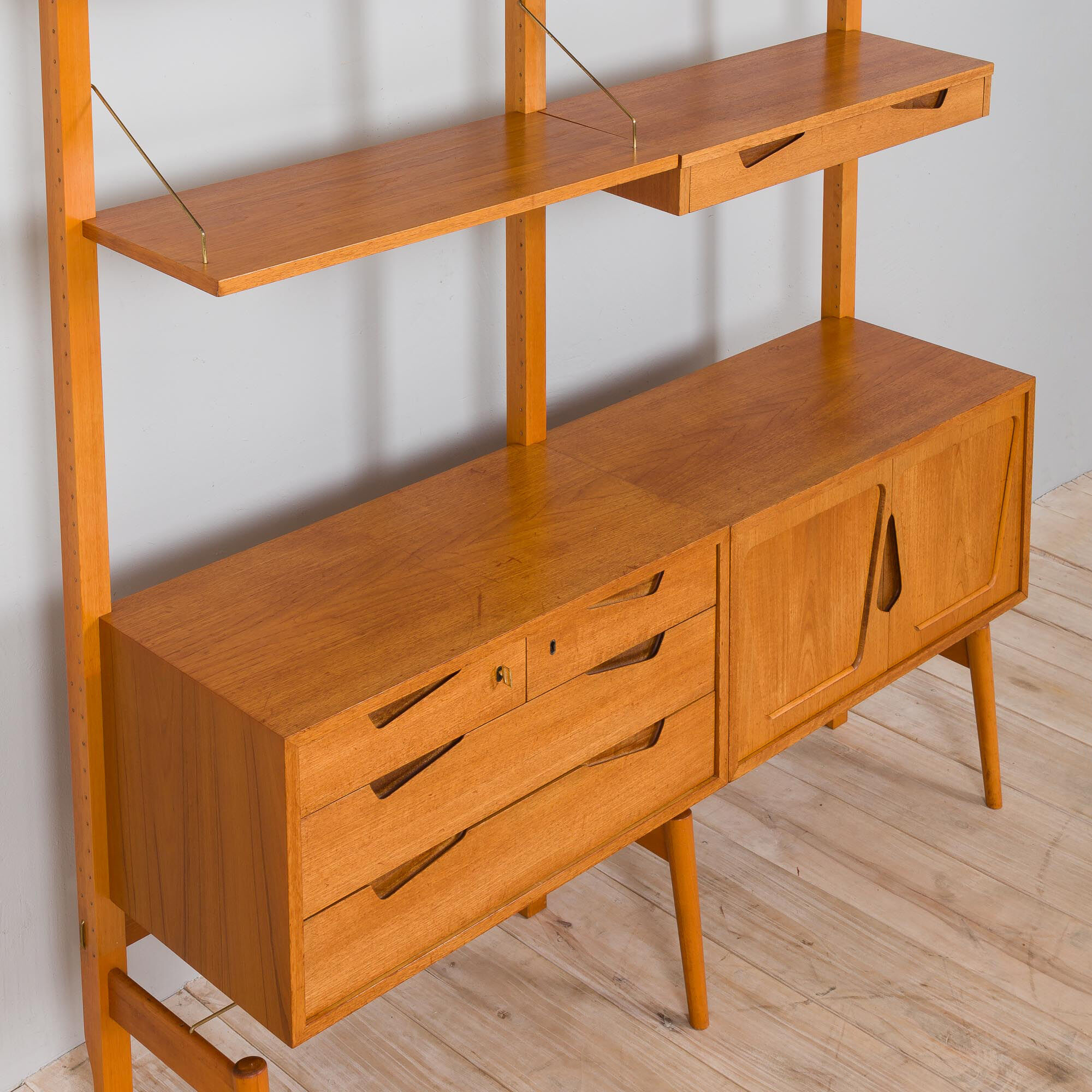 Rival 2 bay teak wall unit with 3 cabinets and 5 shelves by Brodrene Jatogs Norway, Kjell Riise, 196