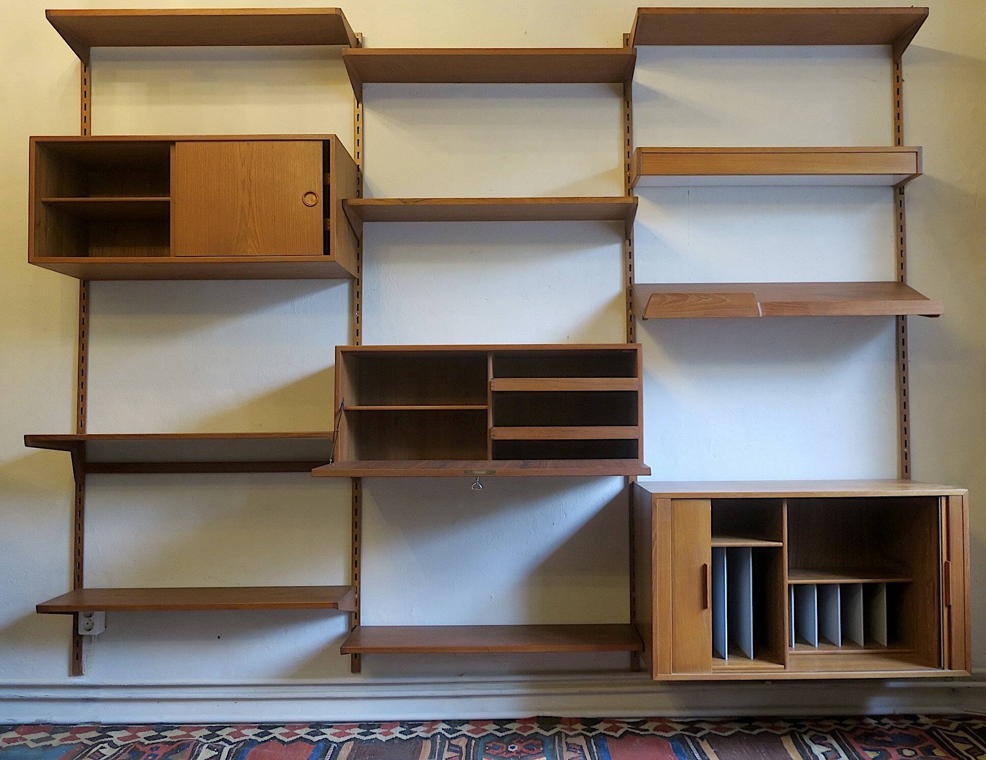Modular 3-compartment teak wall shelving system with desk and lighting by Kai Kristiansen for FM, Denmark, 1960s