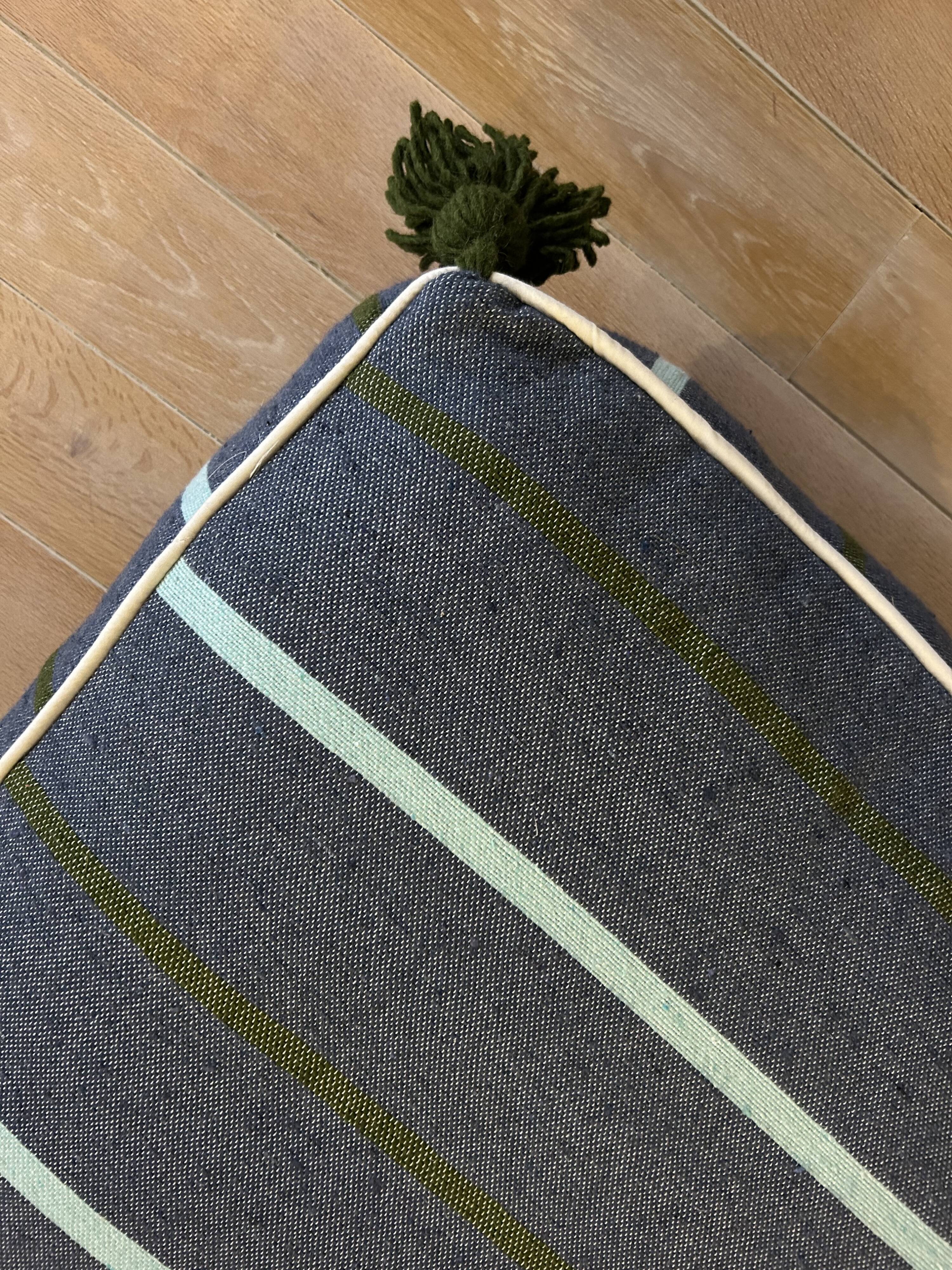 Blue striped cotton pouf
