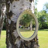 Oval mirror with golden knot