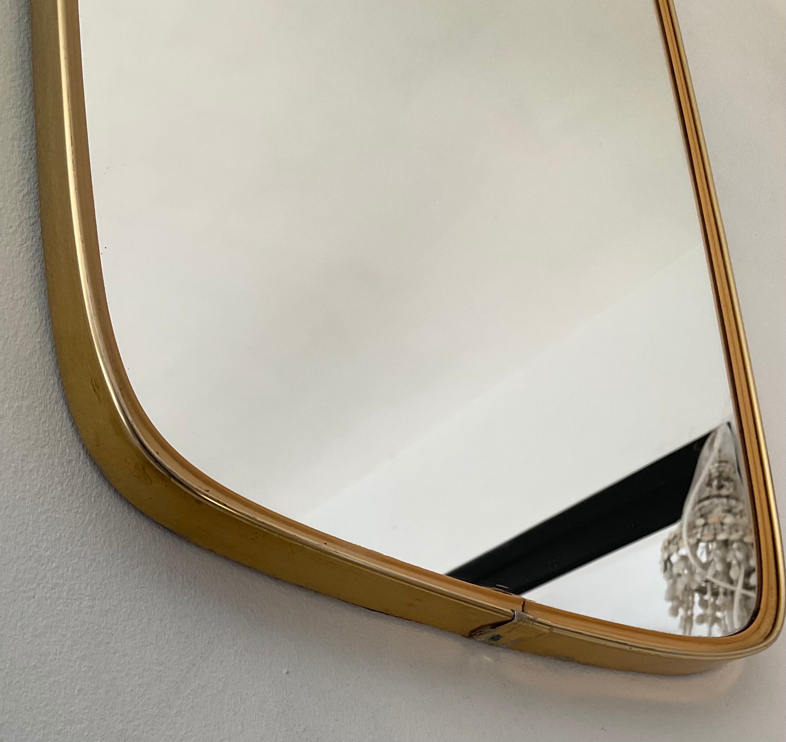 Free formę asymmetric mirror of the 70s