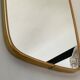 Free formę asymmetric mirror of the 70s