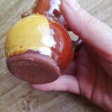 Small two-tone brown-yellow terracotta pitcher