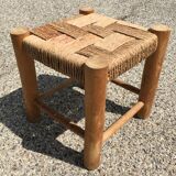 Wooden stool seated in braided rope