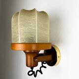 Pair of articulated "Cocoon" wall lights in resin and pine, Italy, circa 1970s