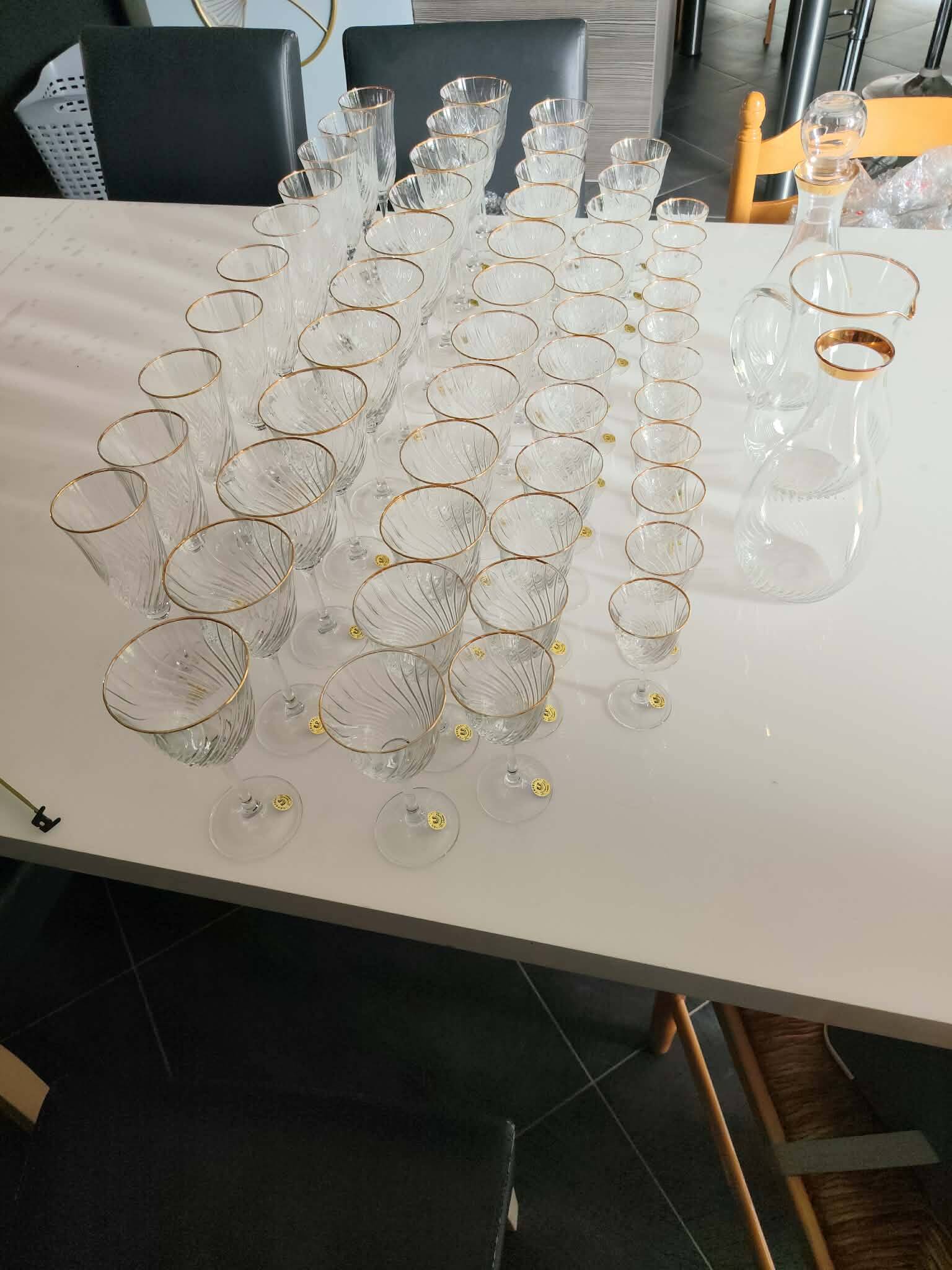 Crystal glassware set with decanter.