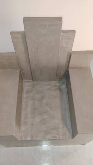 Architectural armchair in polished concrete – Unique artisan piece.