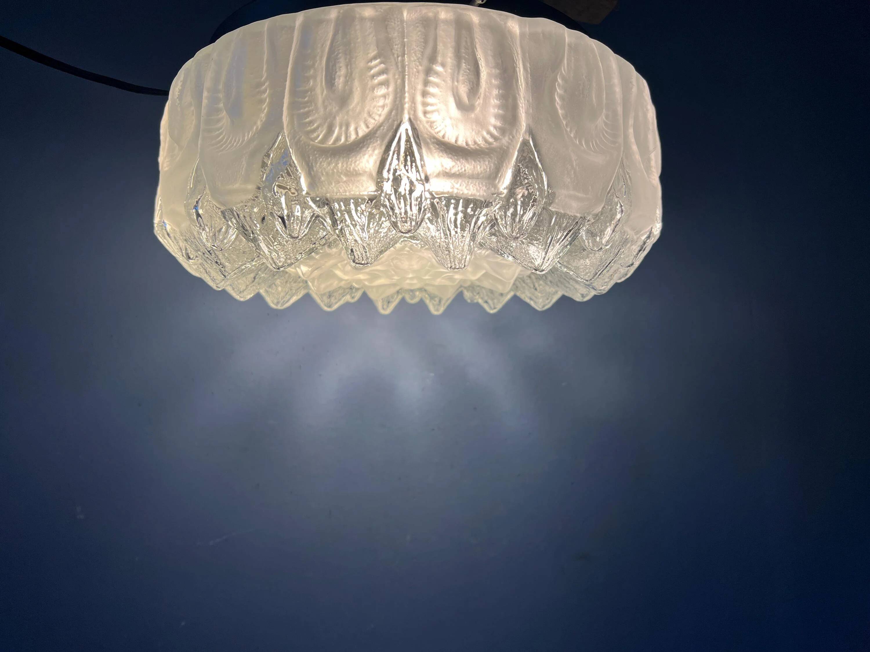 Vintage mid-century decorative ceiling light in thick glass.