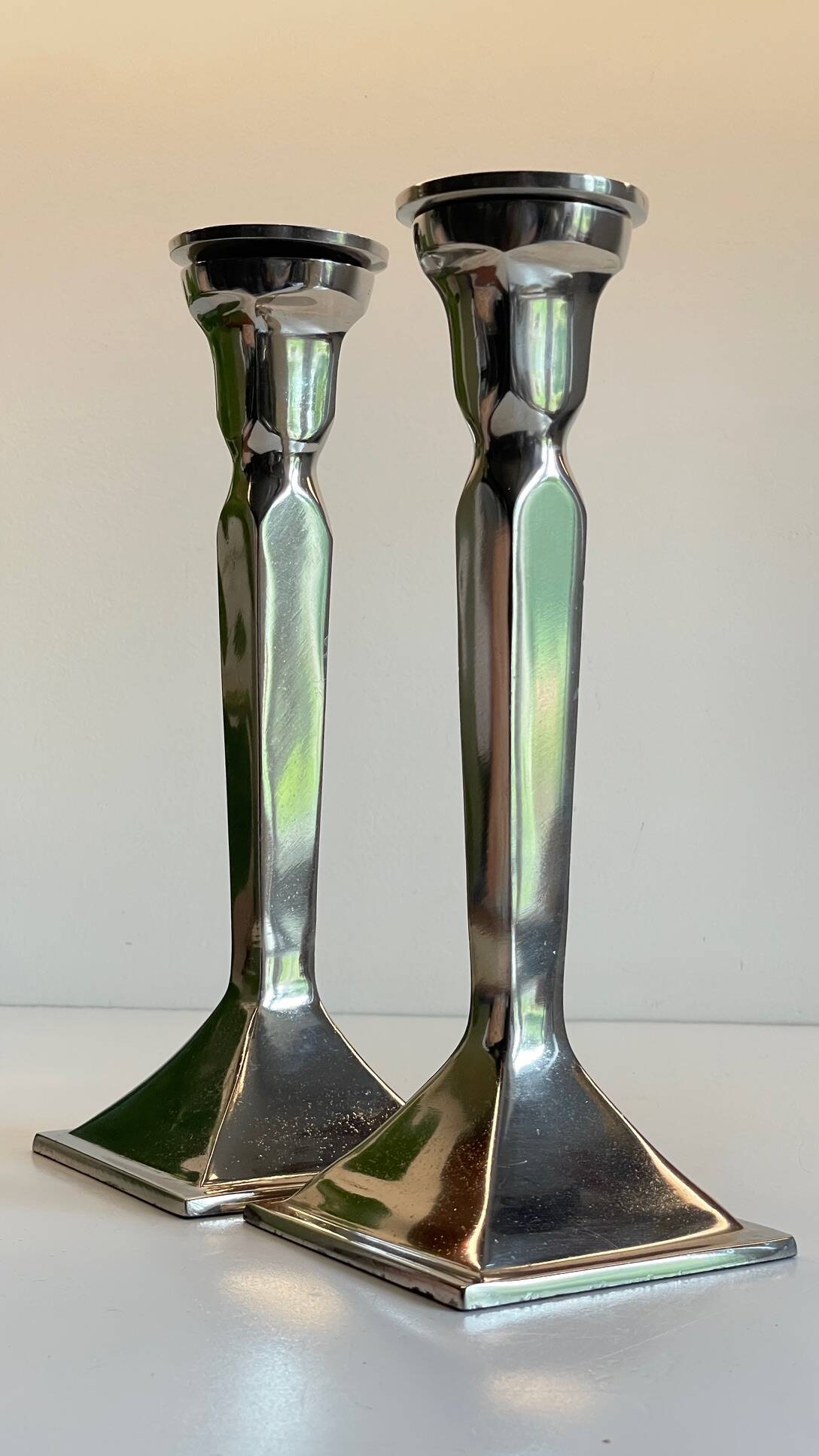 Pair of vintage cast aluminum candlesticks