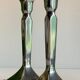 Pair of vintage cast aluminum candlesticks