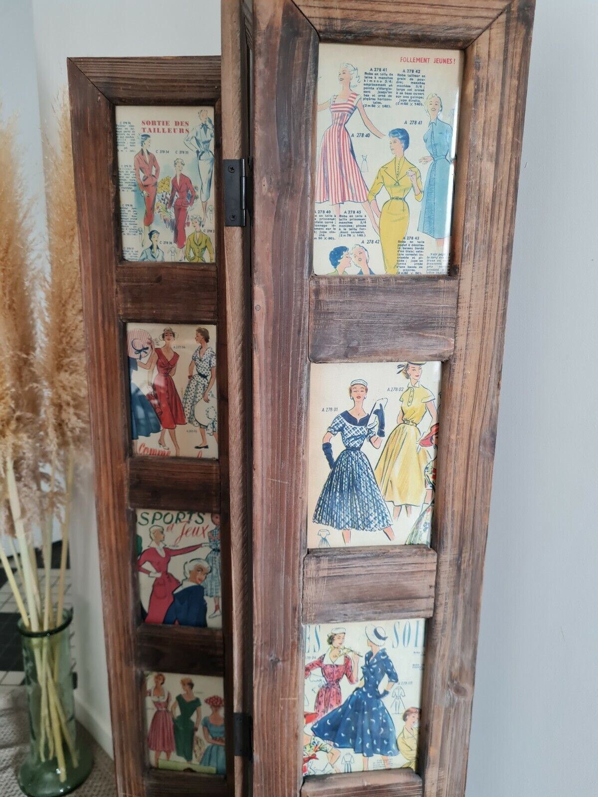 Wooden screen with vintage haute couture images or for photos