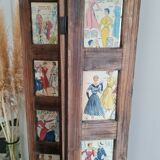 Wooden screen with vintage haute couture images or for photos