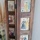 Wooden screen with vintage haute couture images or for photos