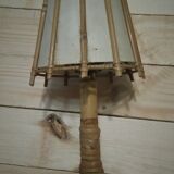 Rattan wall sconce