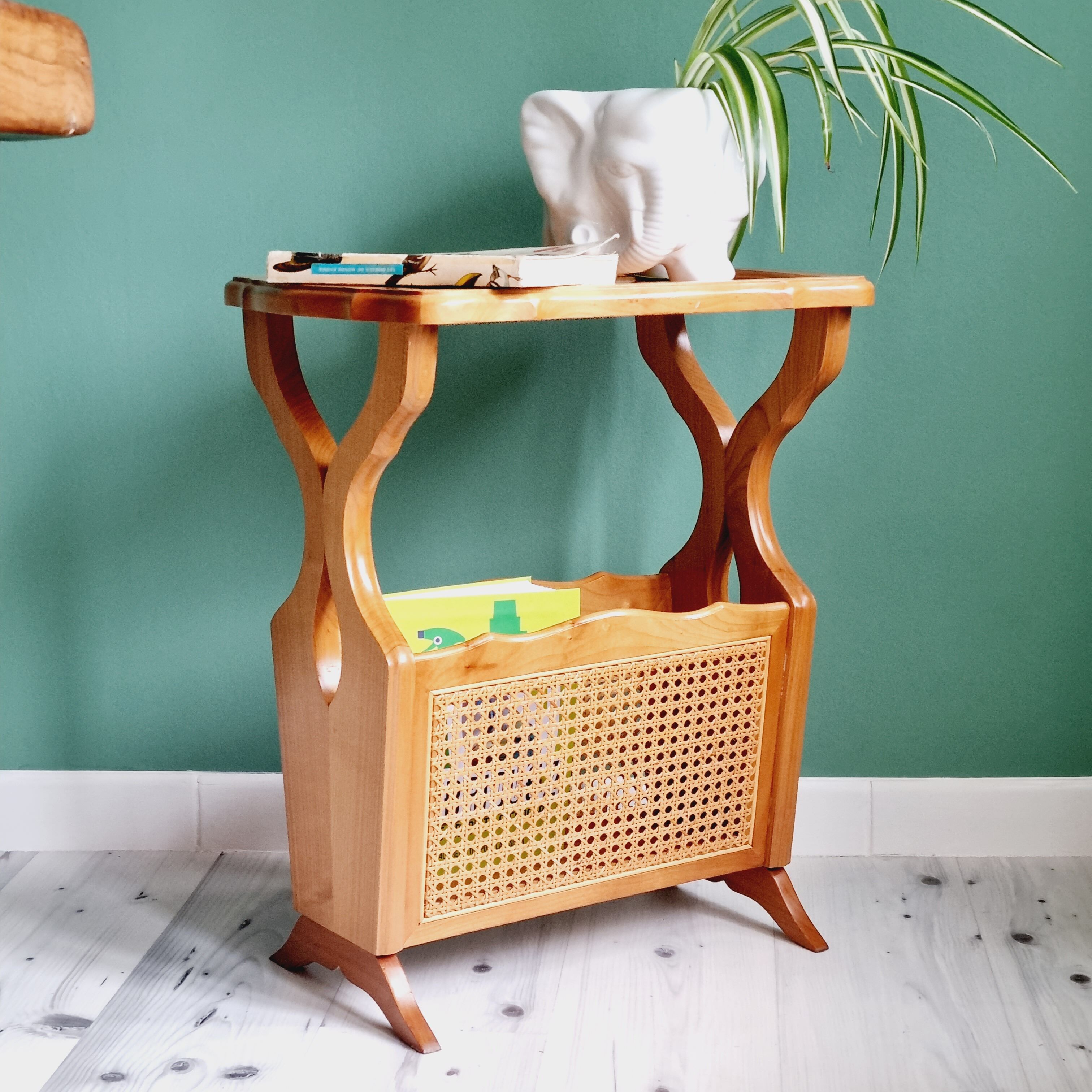 Side table with wooden and cane magazine holder
